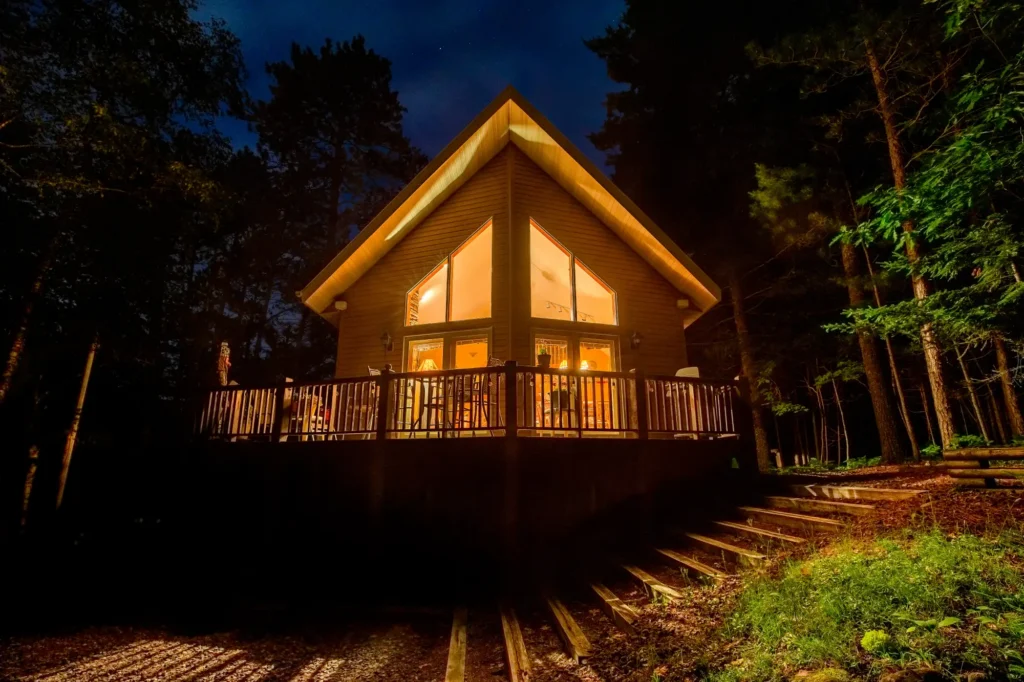 a southwest washington home in the woods with gorgeous exterior lighting